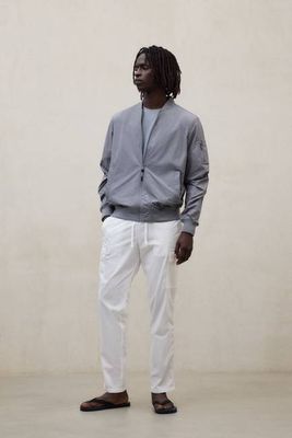WHITE TARGO TROUSERS