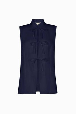 The Alma Stand-Up Collar Tie Vest in navy blue