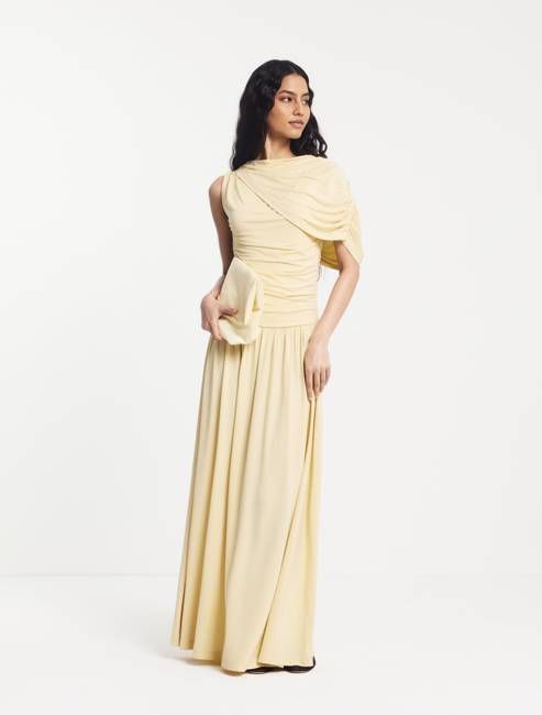 Mila Asymmetrical Caped Shoulder Maxi Dress in Butter Milk