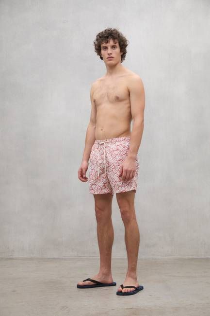 RED BEQUIA SWIM TRUNKS