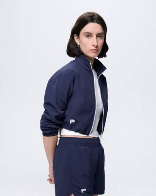 Damenjacke mit Reißverschluss aus recyceltem Nylon—Granite Navy
