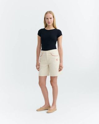 Luisa raw shorts with hand-embroidered edging