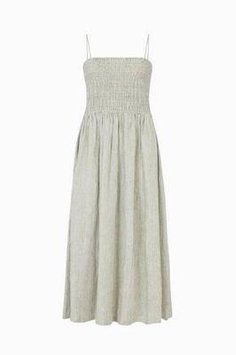The Harlow Smocked Maxi Dress in striped olive green