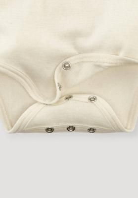 Slim long-sleeved body made of organic cotton with merino wool and silk