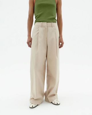 Beigefarbene Patty-Hose mit weitem Bein