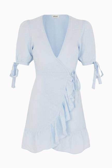 The Catalina Mini Wrap Dress in sky blue